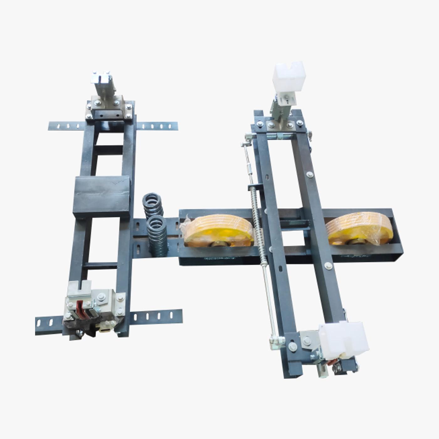 Pair of MRL safety gear assemblies in gunmetal steel channel with brass-lined wedges, springs and threaded actuating linkage